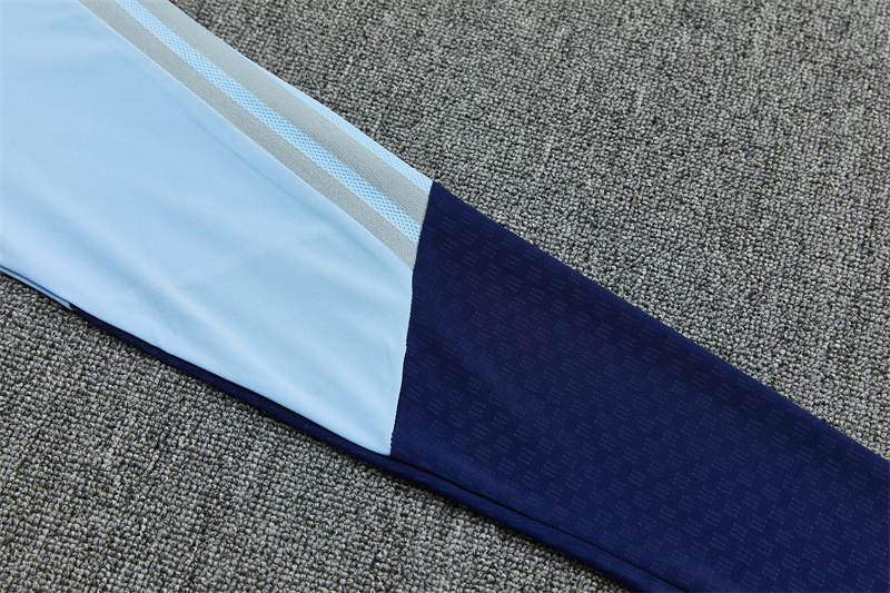 26/27 Ajax Light Blue Tracksuits