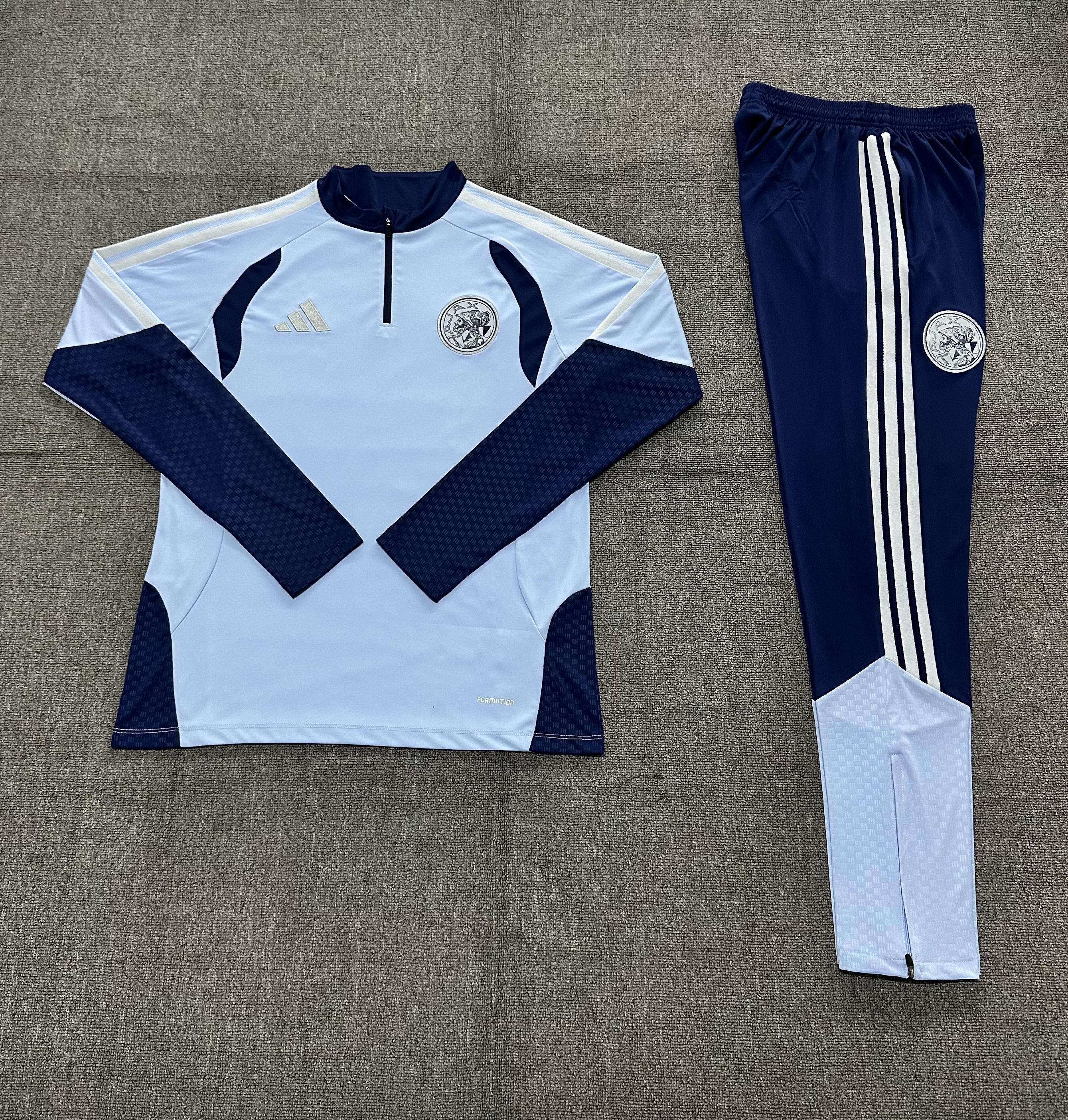 26/27 Ajax Light Blue Tracksuits