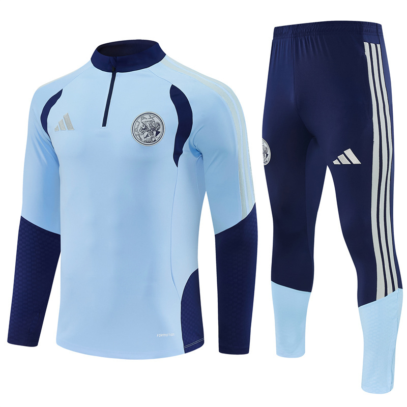 26/27 Ajax Light Blue Tracksuits