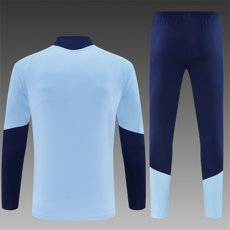 26/27 Ajax Light Blue Tracksuits