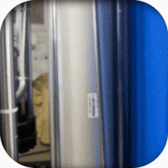 5-Gallon capacity PUR hot melt adhesive system for carton bonding applications