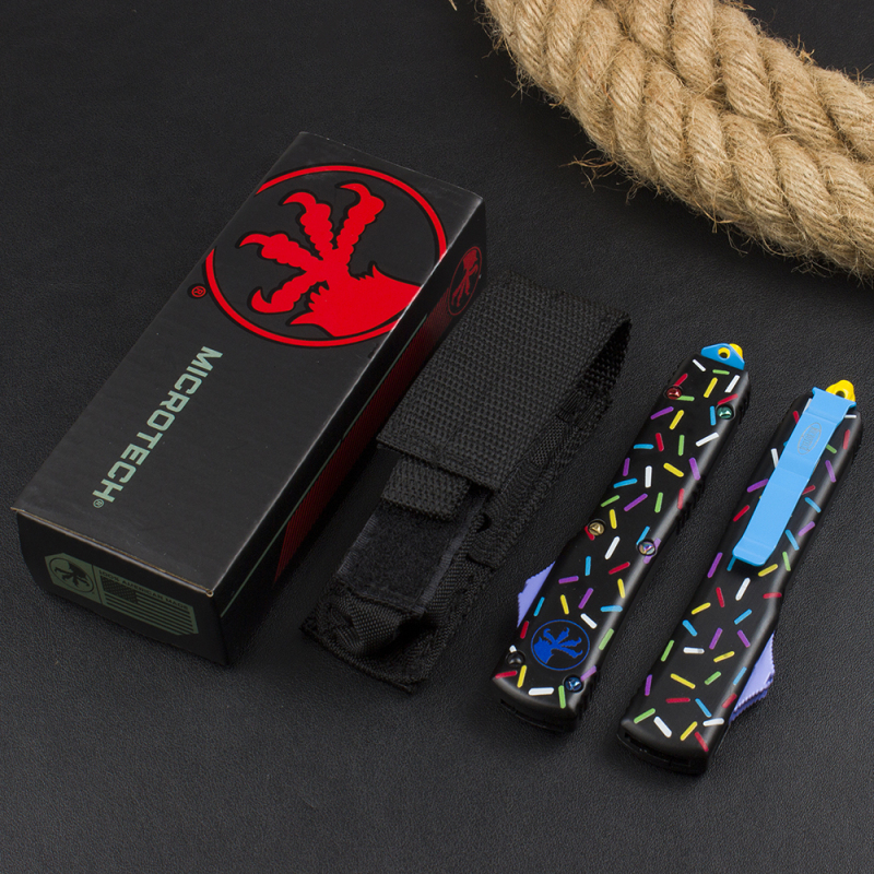 Microtech Black Donut UTX-70 AUTO OTF Knife 3.34" 440C Plain Blade, Zinc Alloy Handles