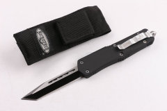 Microtech Combat Troodon A07 AUTO OTF Knife 3.54" 440 Serrated Dagger Blade, Zinc Aluminum Alloy Handles