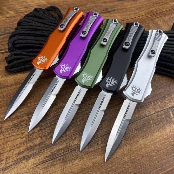 Microtech Hera OTF AUTO Knife 2.79" D2 Double Edge Serrated Blade, Aviation Aluminum Handles