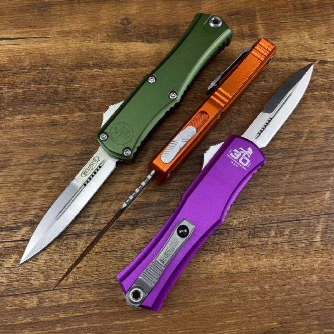 Microtech Hera OTF AUTO Knife 2.79" D2 Double Edge Serrated Blade, Aviation Aluminum Handles