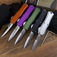 Microtech Hera OTF AUTO Knife 2.79" D2 Double Edge Serrated Blade, Aviation Aluminum Handles