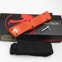 Microtech Troodon AUTO OTF Knife 3.74" M390 Double Combo Edge Dagger Blade, Orange Aluminum Handles