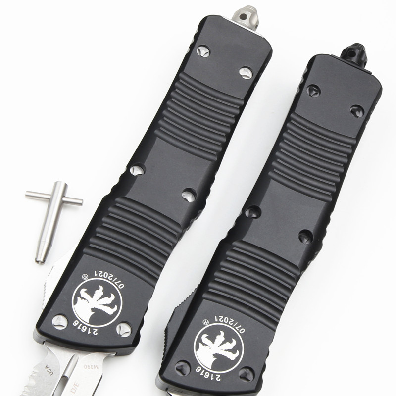 Microtech Troodon AUTO OTF Knife 3.74" M390 Double Combo Edge Dagger Blade, Black Aluminum Handles
