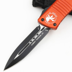 Microtech Troodon AUTO OTF Knife 3.74" M390 Double Combo Edge Dagger Blade, Orange Aluminum Handles
