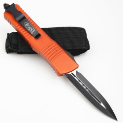 Microtech Troodon AUTO OTF Knife 3.74" M390 Double Combo Edge Dagger Blade, Orange Aluminum Handles