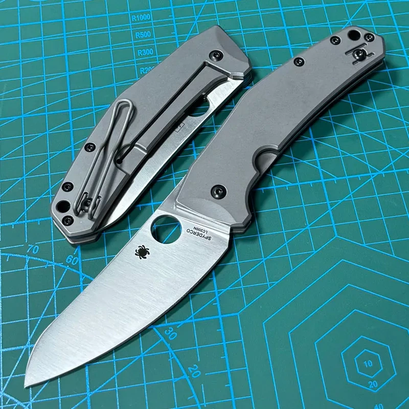 Spyderco Marcin Slysz Folding Knife 3.15" LC200 N Satin Plain Blade, Gray Titanium Handles, Frame Lock - C211TIP