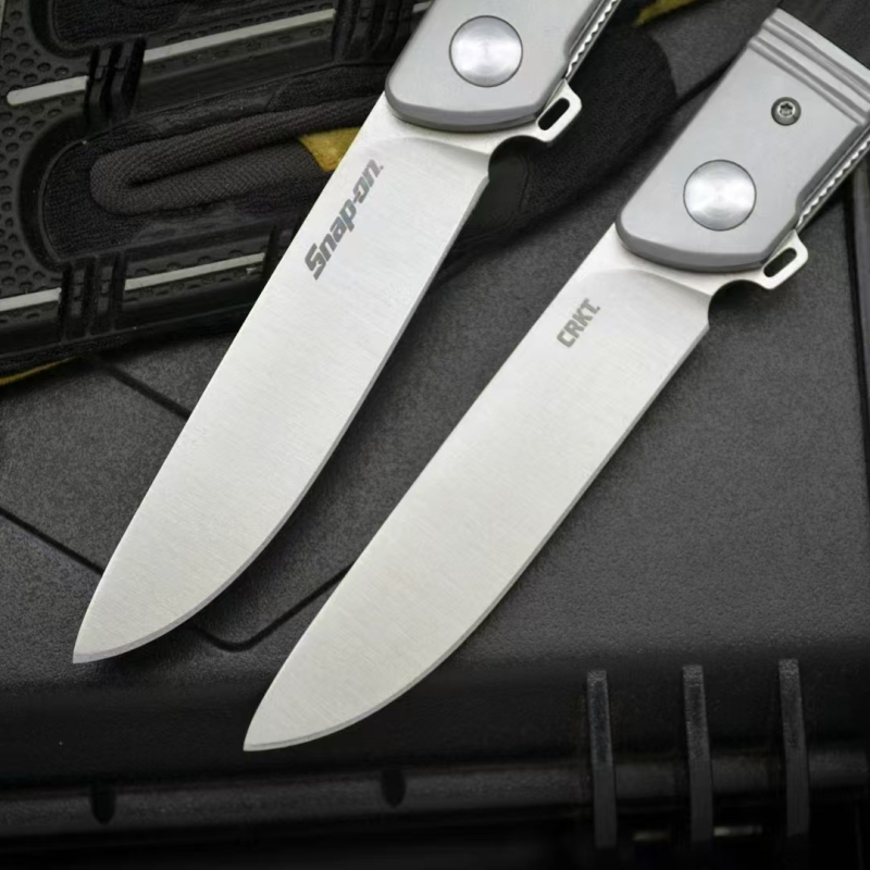 CRKT 5720 Bamboozled Assisted Flipper Knife 3.27" D2 Satin Plain Blade, Black G10 Handles with Steel Bolsters