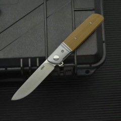 CRKT 5720 Bamboozled Assisted Flipper Knife 3.27" D2 Satin Plain Blade, Black G10 Handles with Steel Bolsters