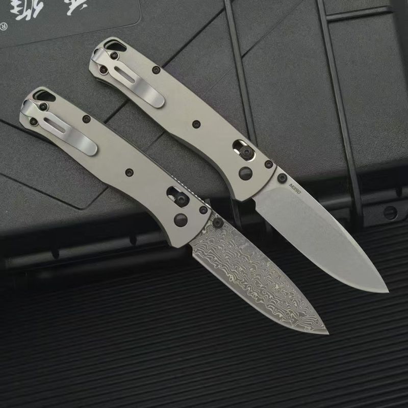 BM 535 Bugout AXIS Folding Knife 3.15" Damascus/D2 Satin Plain Blade, TC4 Handles