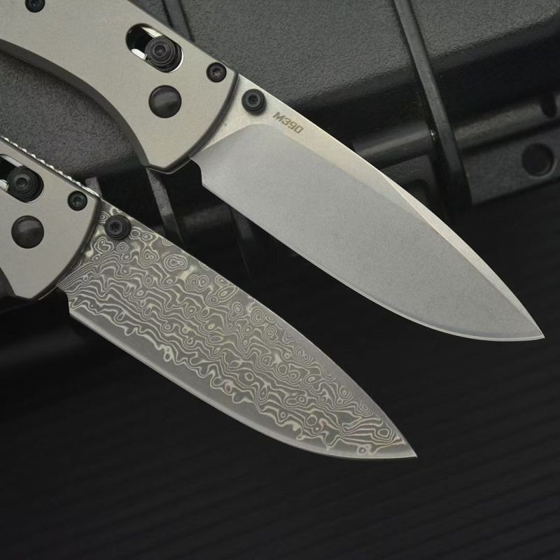 BM 535 Bugout AXIS Folding Knife 3.15" Damascus/D2 Satin Plain Blade, TC4 Handles