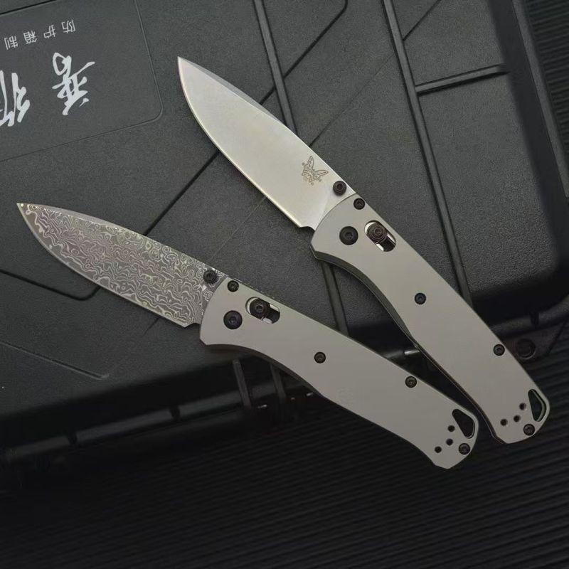 BM 535 Bugout AXIS Folding Knife 3.15" Damascus/D2 Satin Plain Blade, TC4 Handles