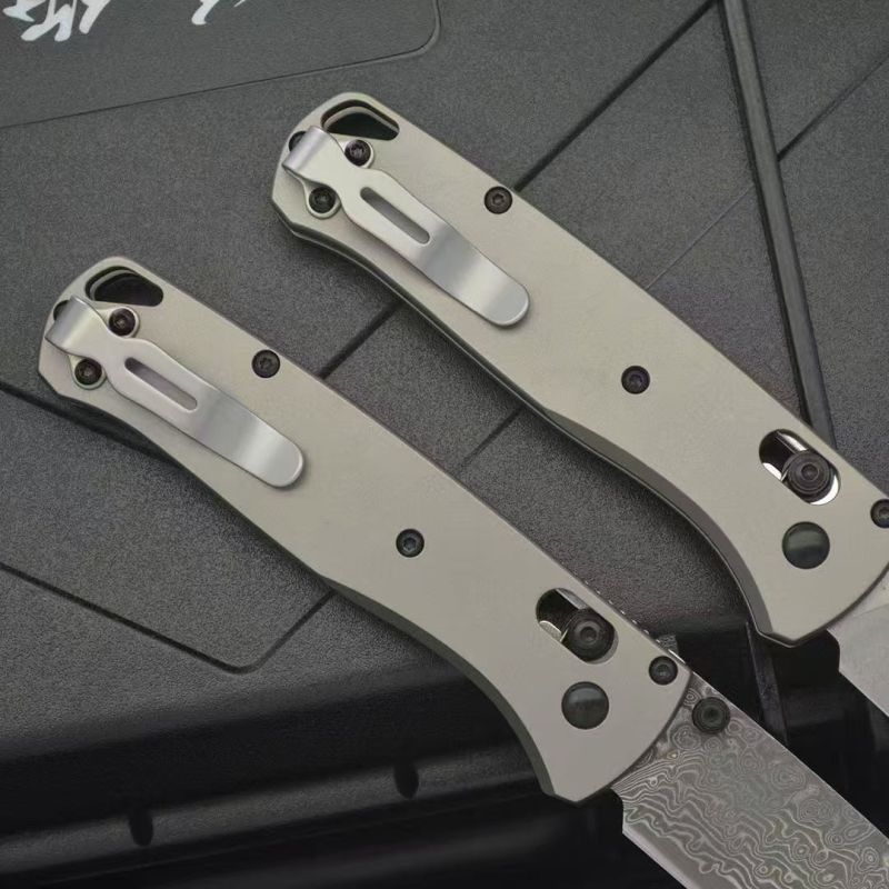 BM 535 Bugout AXIS Folding Knife 3.15" Damascus/D2 Satin Plain Blade, TC4 Handles
