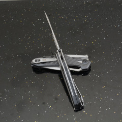 ZT 0990 Flipper Knife 3.26" CPM-20CV Stonewashed Drop Point Blade, Carbon Fiber Handles with Steel Overlay