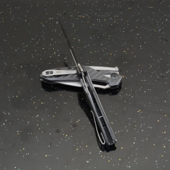 ZT 0990 Flipper Knife 3.26" CPM-20CV Stonewashed Drop Point Blade, Carbon Fiber Handles with Steel Overlay