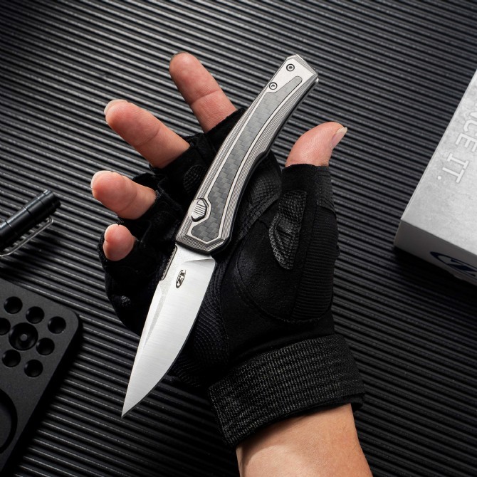 ZT 0556 AUTO Folding Knife 3.35" CPM-MagnaCut Two-Tone Drop Point Blade, Titanium Handles with Carbon Fiber Inlays
