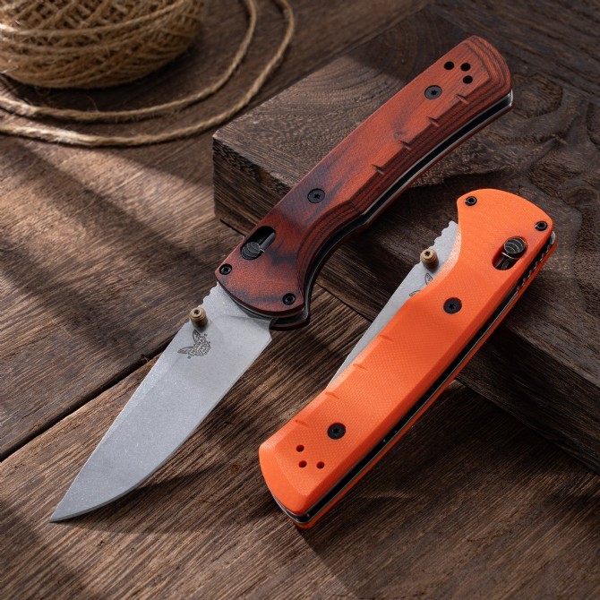 BM 15090 Hunt Bugout Axis Folding 3.46" Magnacut Clip Point Blade, G10/Dymondwood Handles