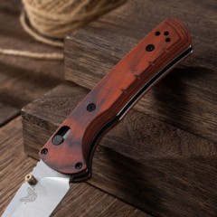 BM 15090 Hunt Bugout Axis Folding 3.46" Magnacut Clip Point Blade, G10/Dymondwood Handles