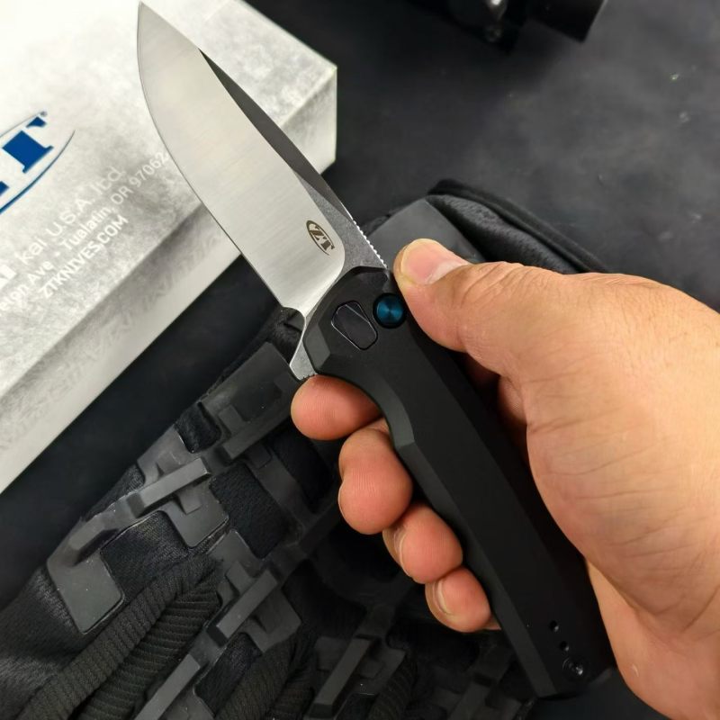 ZT 0044BLK Button Lock Flipper Knife 3.11" CPM-S45VN DLC Drop Point Blade, Titanium Handles