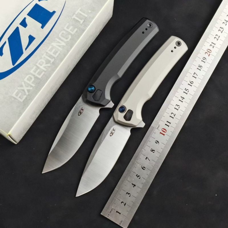 ZT 0044BLK Button Lock Flipper Knife 3.11" CPM-S45VN DLC Drop Point Blade, Titanium Handles