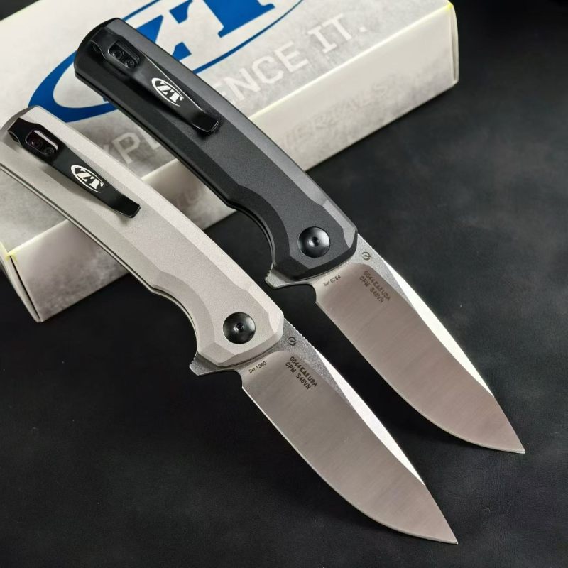 ZT 0044BLK Button Lock Flipper Knife 3.11" CPM-S45VN DLC Drop Point Blade, Titanium Handles