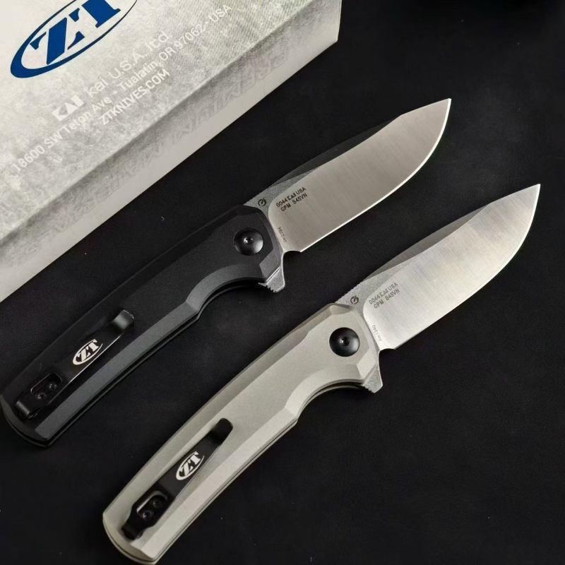 ZT 0044BLK Button Lock Flipper Knife 3.11" CPM-S45VN DLC Drop Point Blade, Titanium Handles