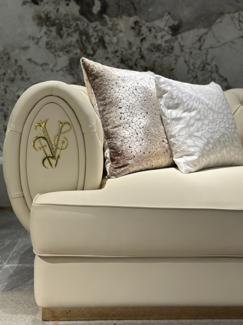 Luxury Cream Tufted Sofa with Decorative Accents