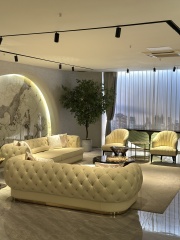 Luxury Cream Tufted Sofa with Decorative Accents