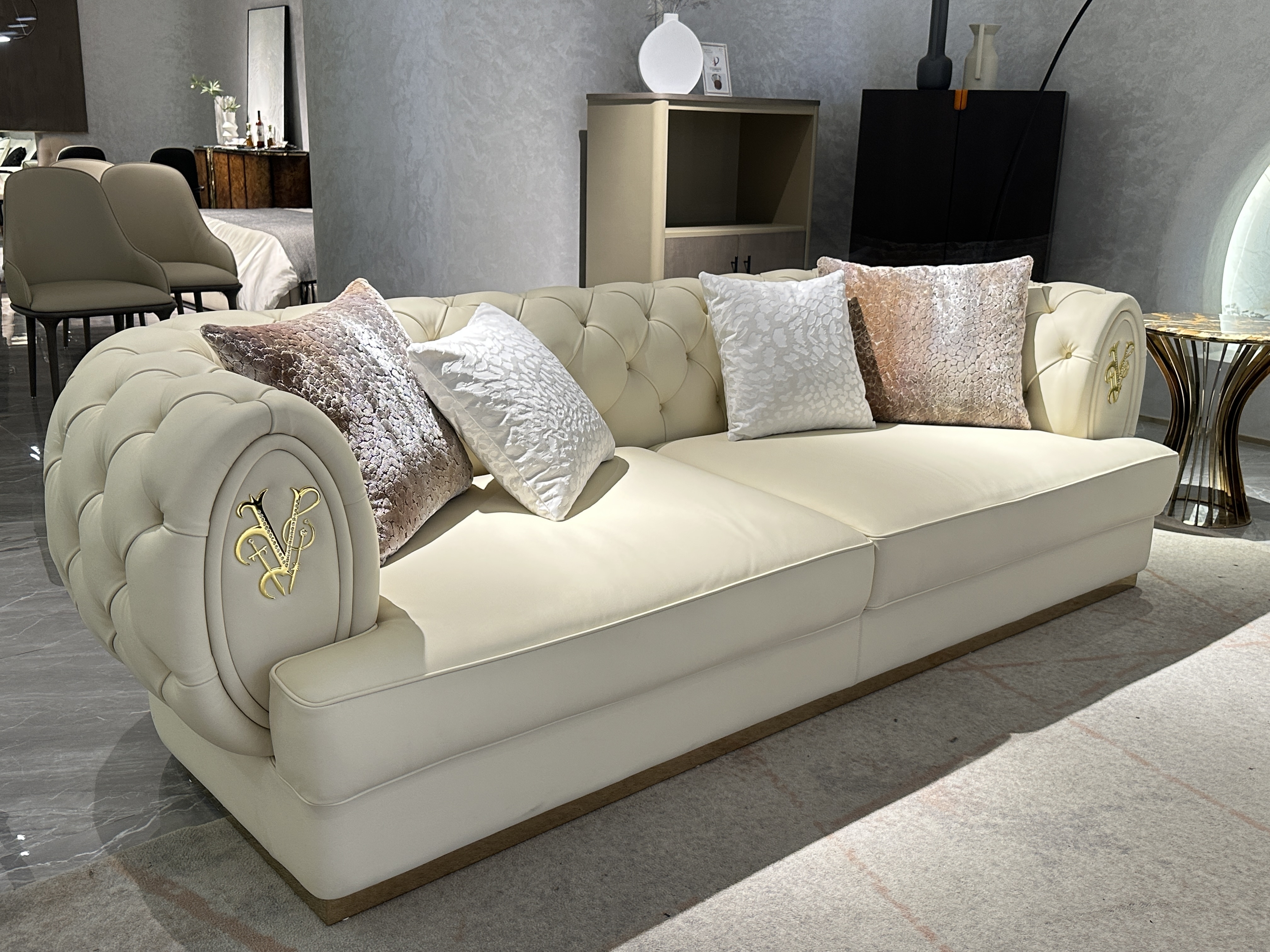 Luxury Cream Tufted Sofa with Decorative Accents