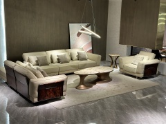 Modern Beige Leather Sofa with Accent Pillows