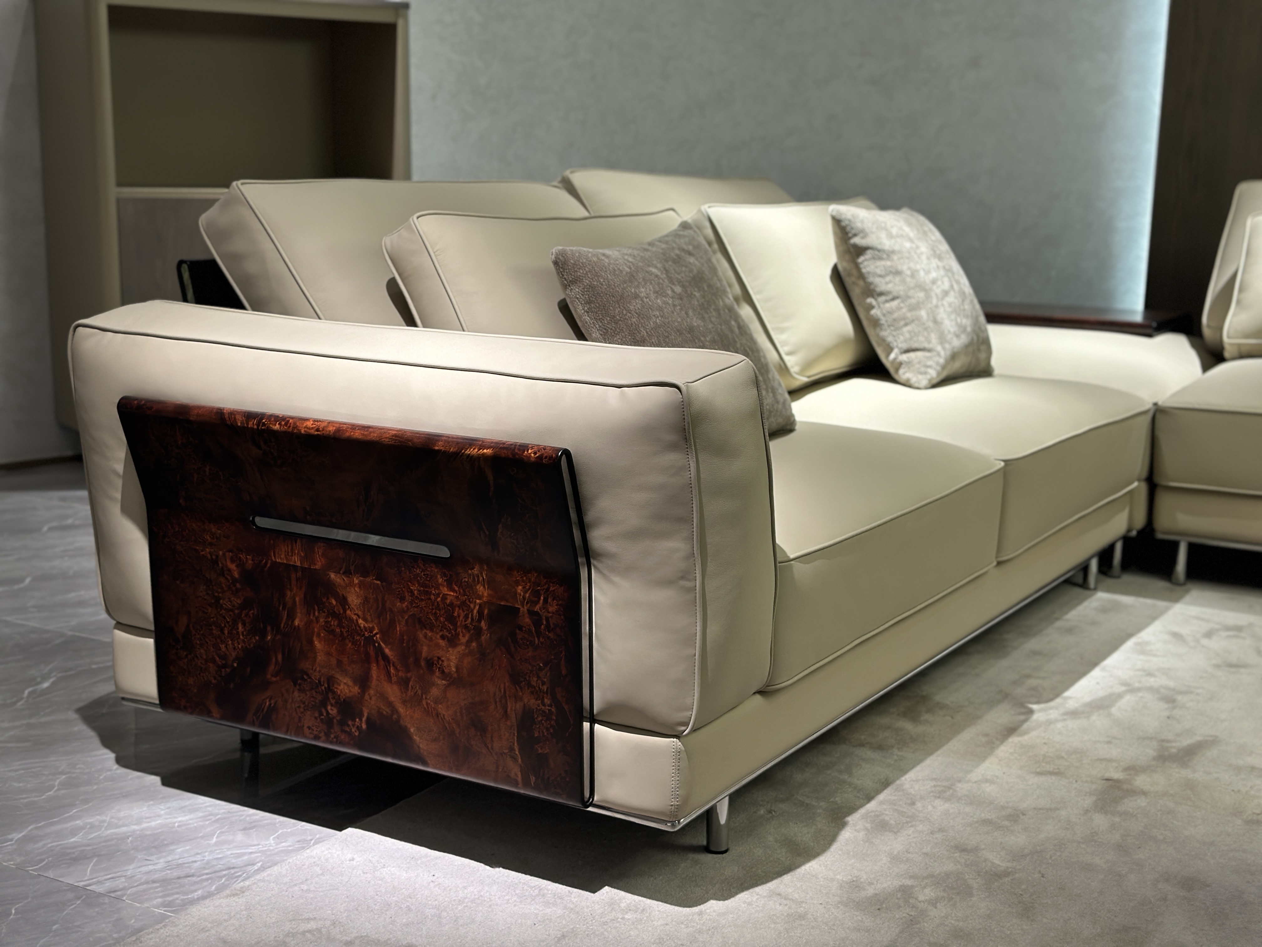 Modern Beige Leather Sofa with Accent Pillows