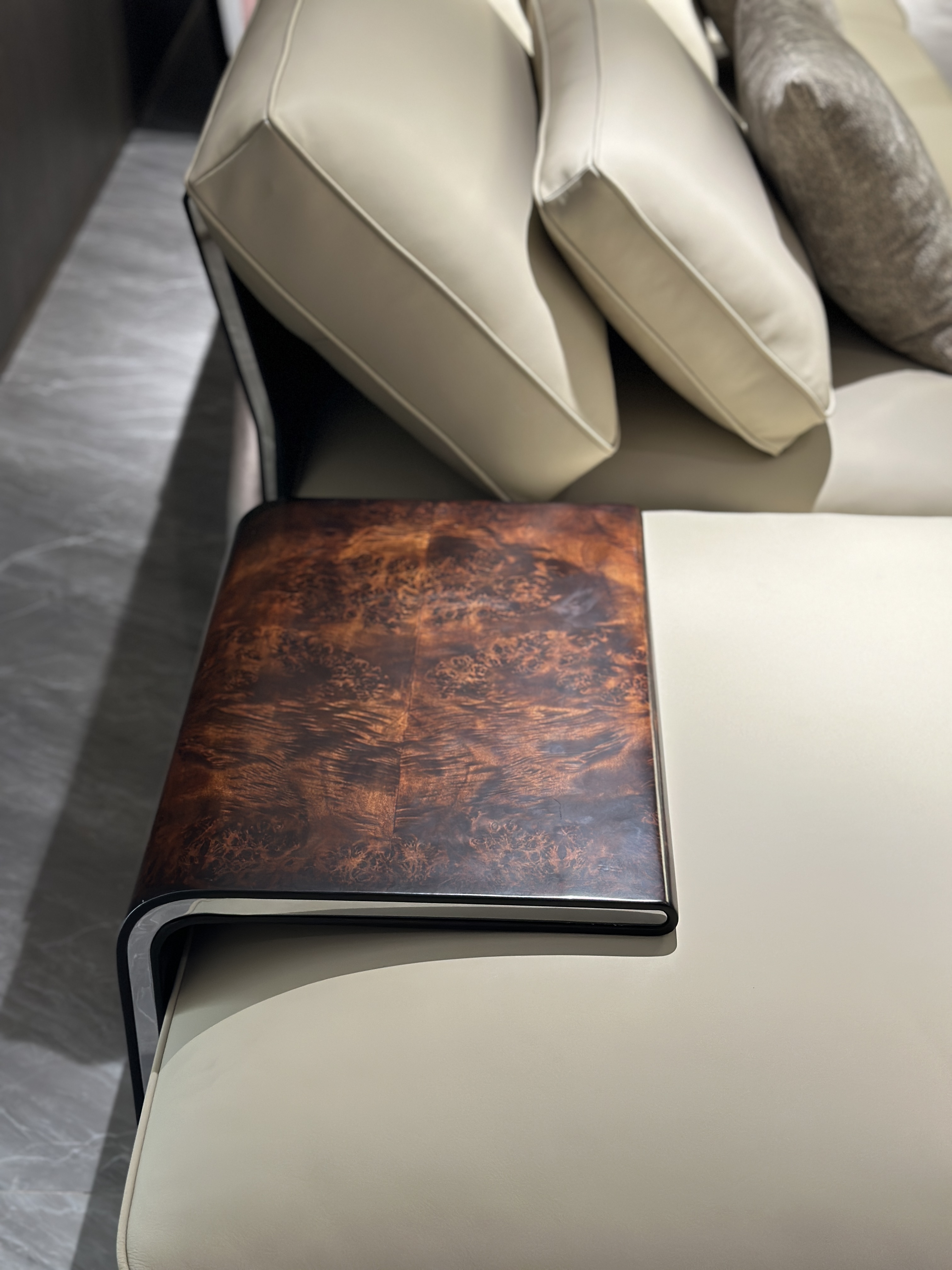 Modern Beige Leather Sofa with Accent Pillows