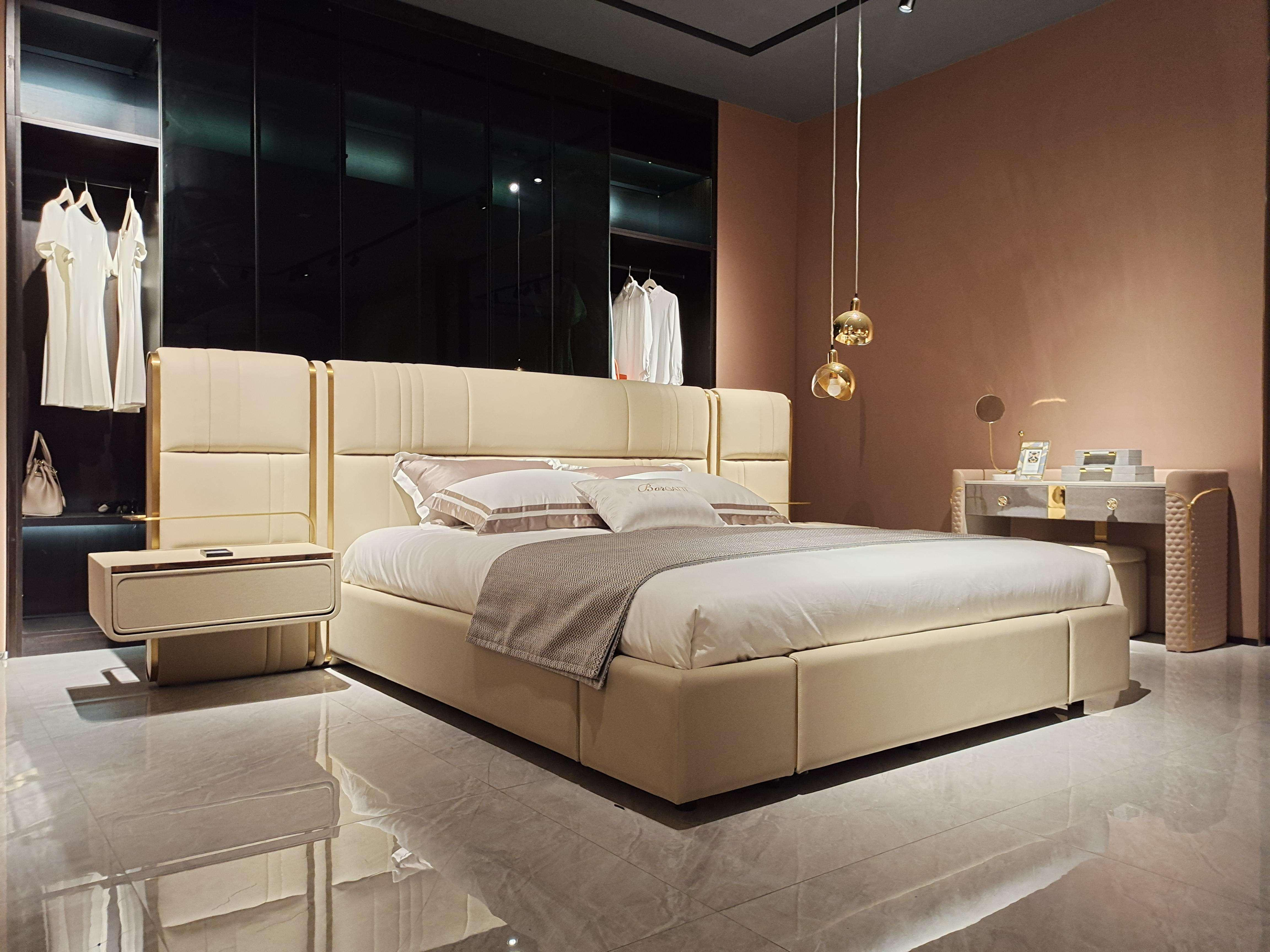 Luxury Upholstered Bed with Integrated Nightstand & Gold Accents