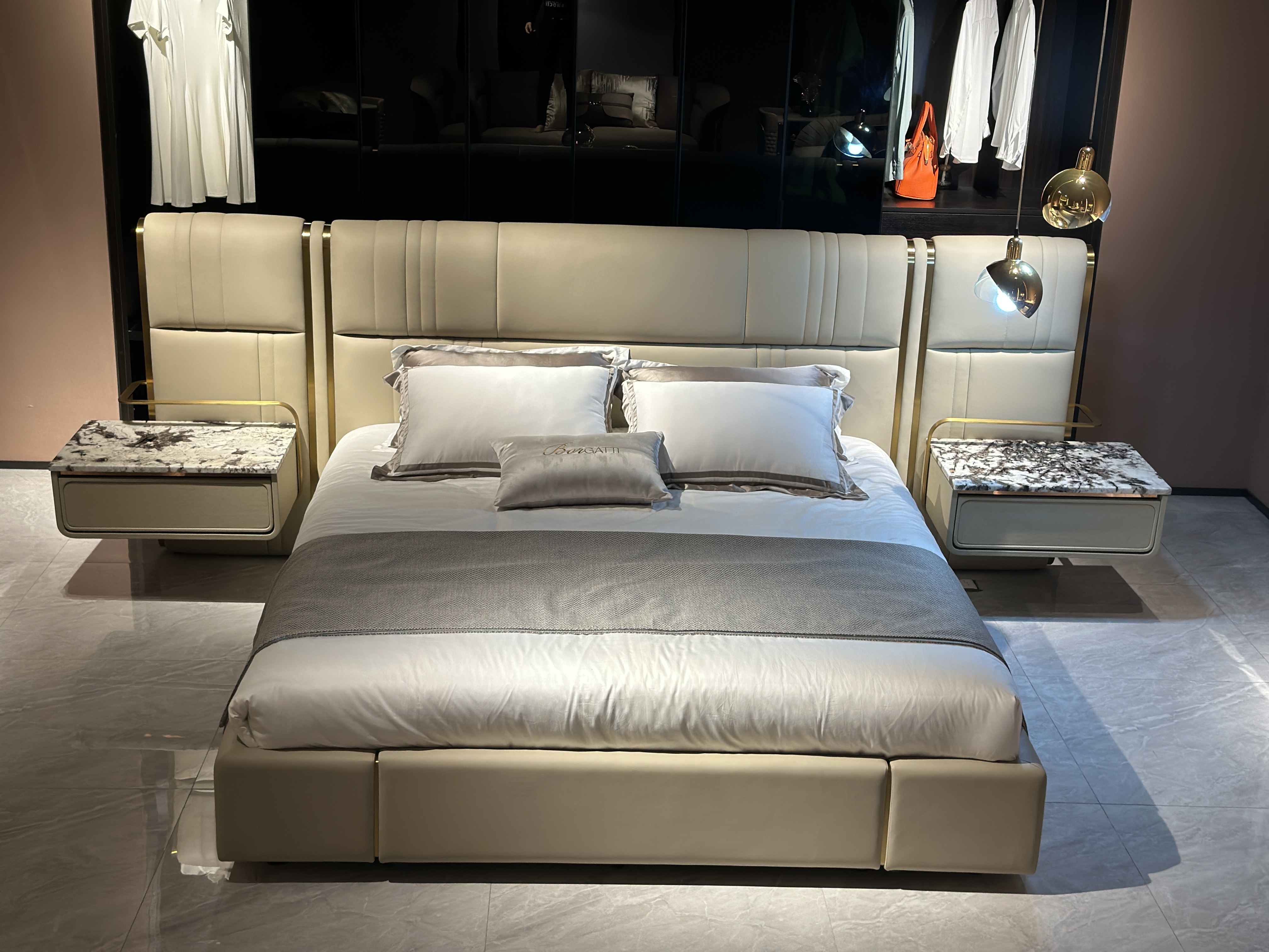 Luxury Upholstered Bed with Integrated Nightstand & Gold Accents
