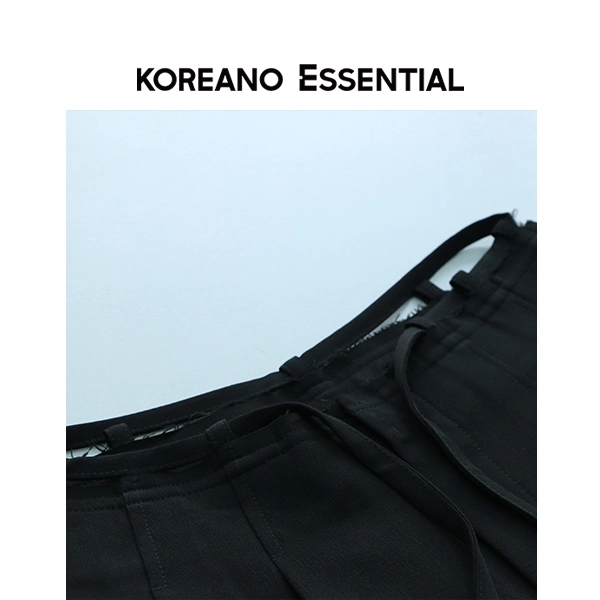 Elegant black draped wide-leg trousers