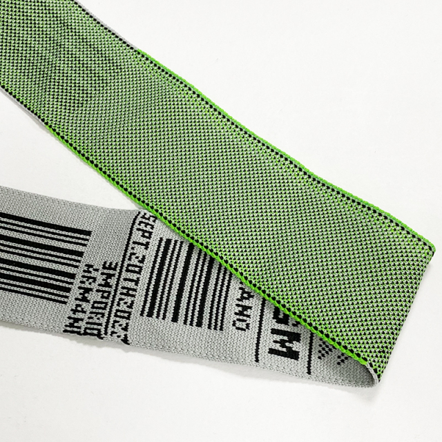 Jacquard letter bar code color striped ribbon fashion casual men's and women's mesh red pants side strap