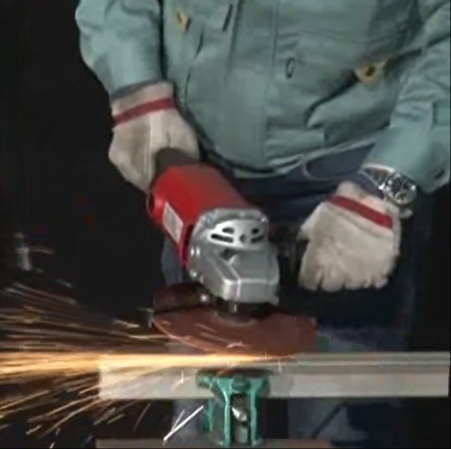 A worker is use Super W grinding Disc for working
