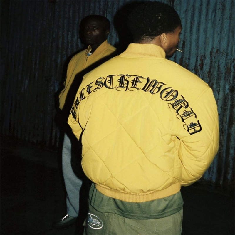 Corteiz Puffer Crtz Olde English Quilted Bomber Jacket Yellow Wearing Effect
