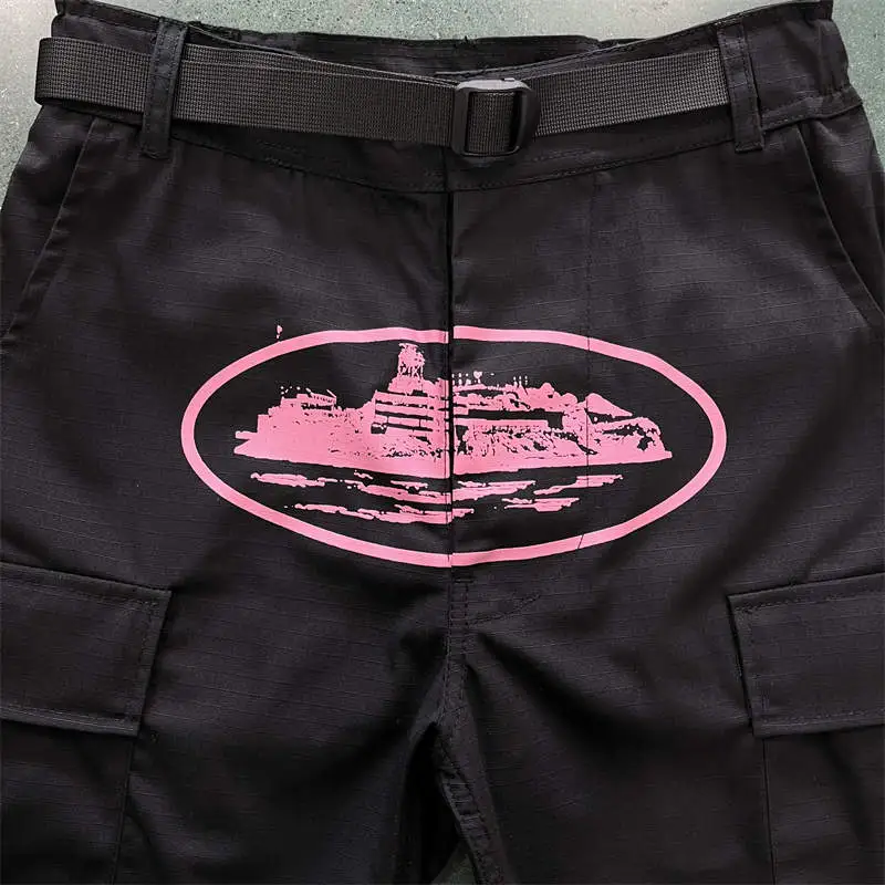 Product detail of the same black and pink Corteiz cargos used for the day-to-night styling plan