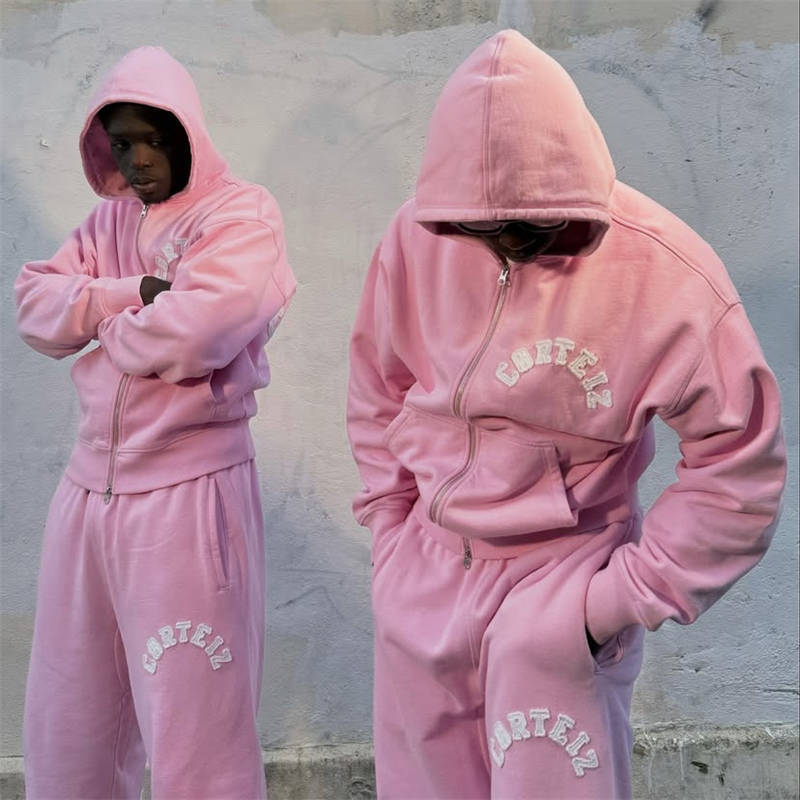 Corteiz Colly Arch Tracksuit Pink Wearing Effect