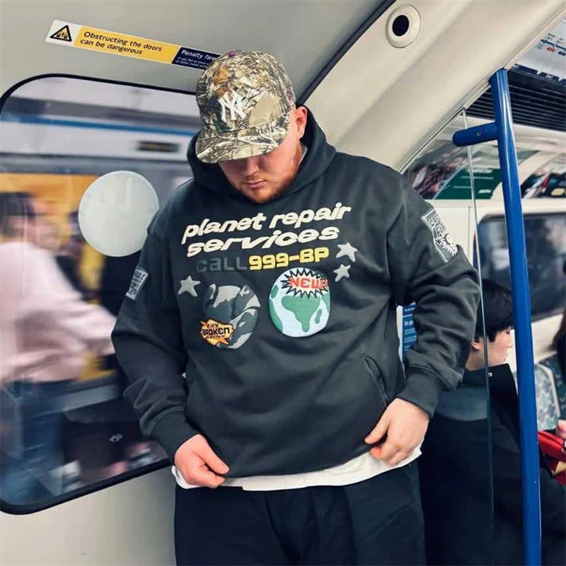 Broken Planet Repair Services Hoodie Wearing Effect