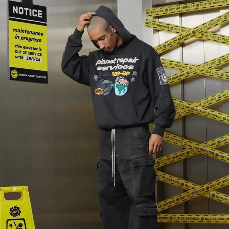 Broken Planet Repair Services Hoodie Wearing Effect