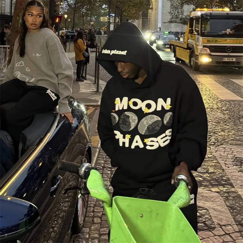 Broken Planet Moon Phases Hoodie Wearing Effect