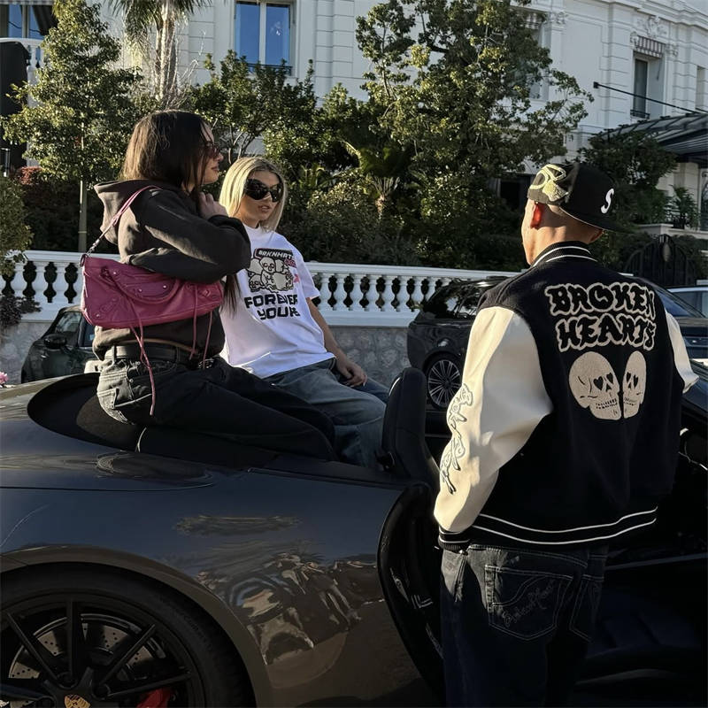 Broken Planet Varsity Jacket Black White Wearing Effect