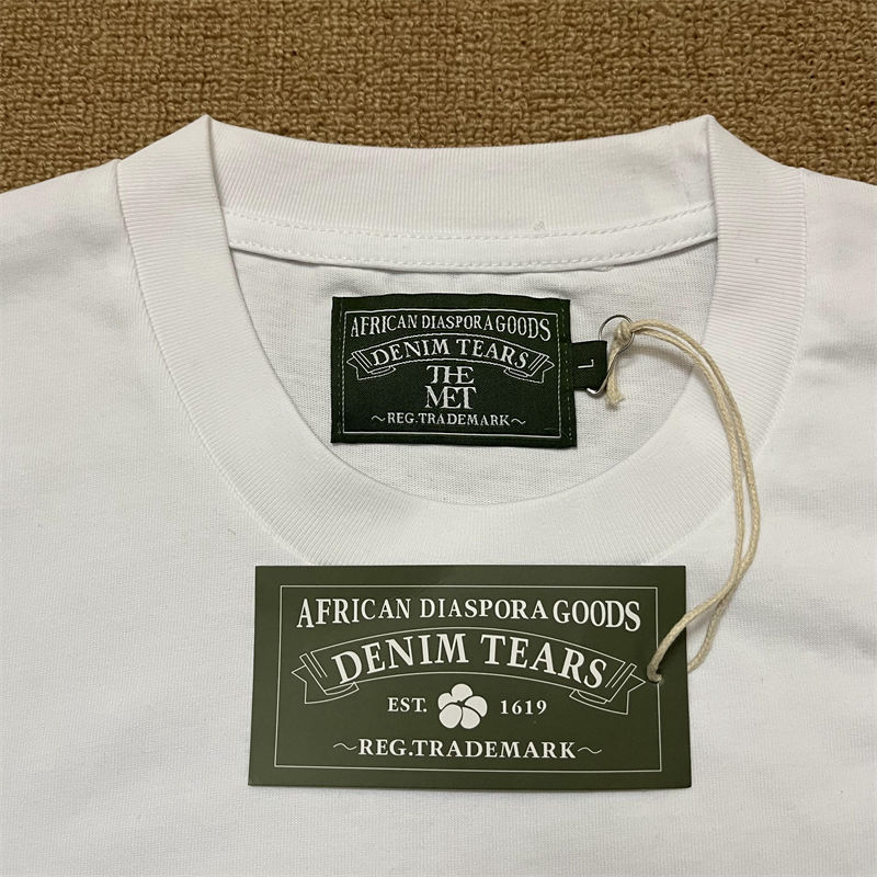 Denim Tears Knowbody Nose Tee