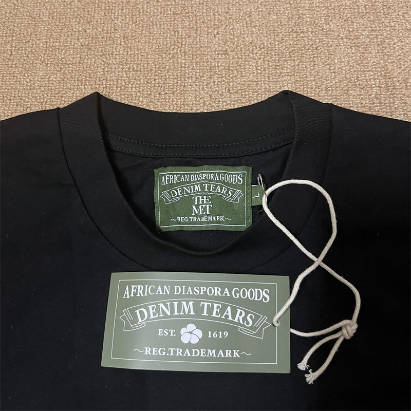 Denim Tears Knowbody Nose Tee